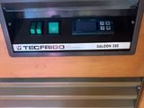 a close up of a counter top oven with a digital timer