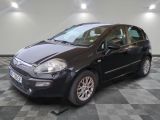 a picture of a small black car parked in a garage