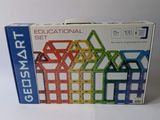 a boxed box of magnetic tiles on a white surface