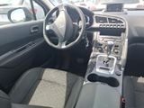 the interior of a car with a steering wheel, dashboard, and dash board