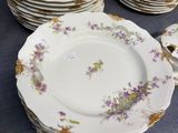 a lot of plates that are on a table