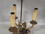 three candles that are sitting on a table