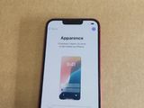 an iphone with an app on the screen sitting on a table