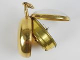 gold plated pocket watch on a white background with a white background