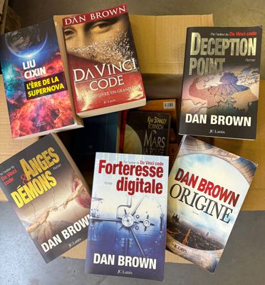 a lot of books that are sitting on a table