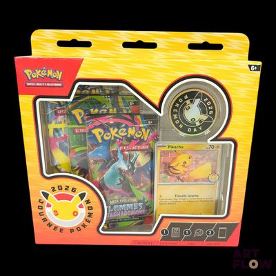 a box of pokemon cards and a coin in it