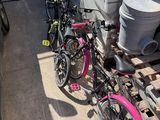 two bikes parked next to each other on a pallet