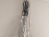 a plastic bag wrapped around a telephone on the wall