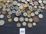 a lot of coins that are on a table