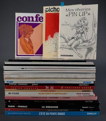 several books are stacked on top of each other on a table