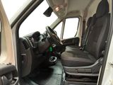 a view of the inside of a van from the driver ' s seat
