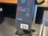 an image of a machine that is sitting on a counter
