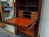 an image of a desk with a mirror on top of it