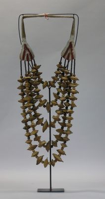 a sculpture of some kind of bird on a stand