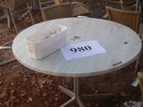 a table that has a box on it with a number on it