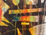abstract painting of a vase filled with yellow, red, green, and orange flowers