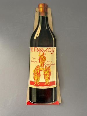 a bottle of wine that is on the wall