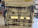 une machine sur laquelle est placé un rouleau de papier