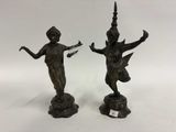 une paire de figurines en bronze représentant un garçon et une fille