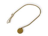 a close up of a necklace with a coin on a chain