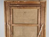 an old wooden frame with a rope hanging from it ' s side