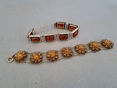 an image of a bracelet and a bracelet with flowers on it