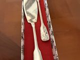 a silverware set in a box on a table