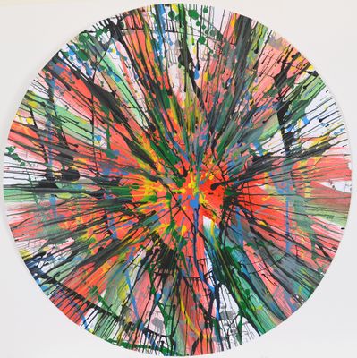 brightly colored artwork on a white wall in a room