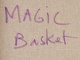 purple writing on a piece of paper that says magic basket