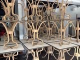 a lot of chairs that are sitting on a table