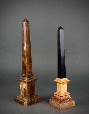 pair of obelisk and obelisk on marble bases
