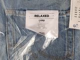 the back pocket of a pair of jeans with a label on it