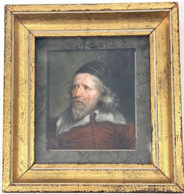 portrait d'un homme barbu dans un cadre doré