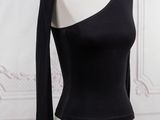 the top of a mannequin with a black shirt on it