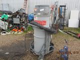an image of a dust collector in a junkyard