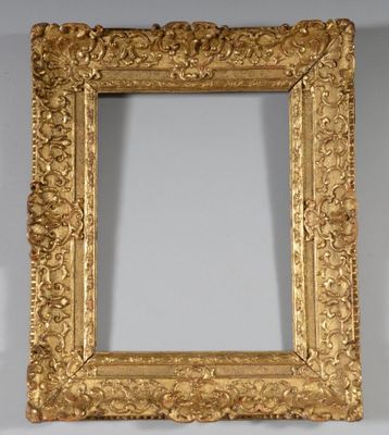 a gold frame with a decorative design on it
