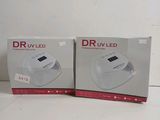 two boxes of dru - led products sitting on top of a white table