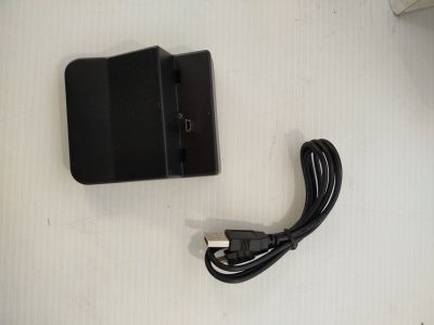a charger and a cable connected to a cell phone