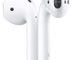 a pair of airpods sitting next to each other on a white surface