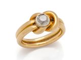 an image of a gold ring with a white diamond