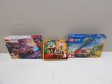 three lego city sets including a fire truck, a fire truck and a fire truck