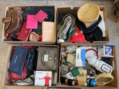 a box full of assorted items sitting on the floor