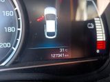 a close up of a car ' s dashboard with a speedometer