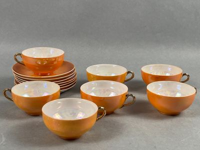 JAPON. Service à thé en porcelaine fine orange et à effet na…