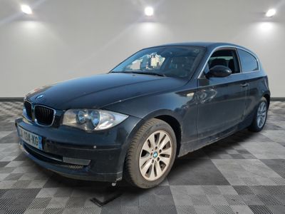 a picture of a blue car parked in a garage