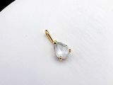 an image of a gold plated pendant with a tear shaped white topazr