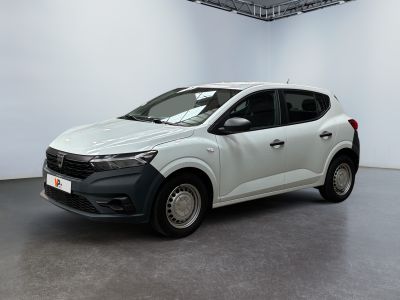 the white car is parked in a large room with white walls