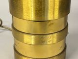 brass plated brass vase with four bands of gold colored metal