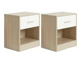 two white nightstands with drawers on each side of them