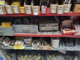 a shelf with many different items on it in a store